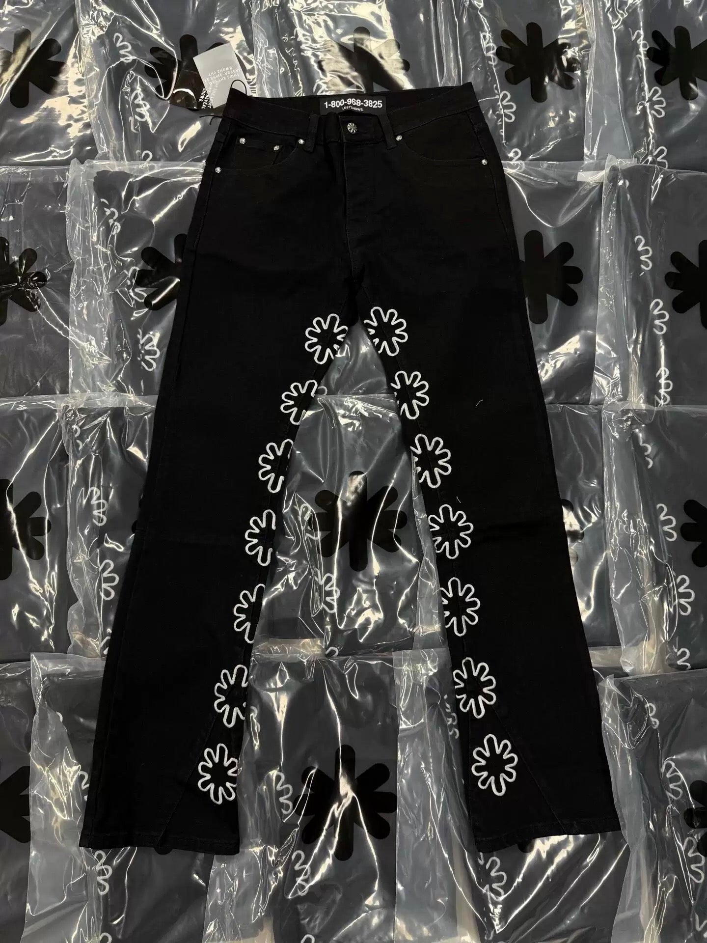 S Flower Stacked Flared Jeans