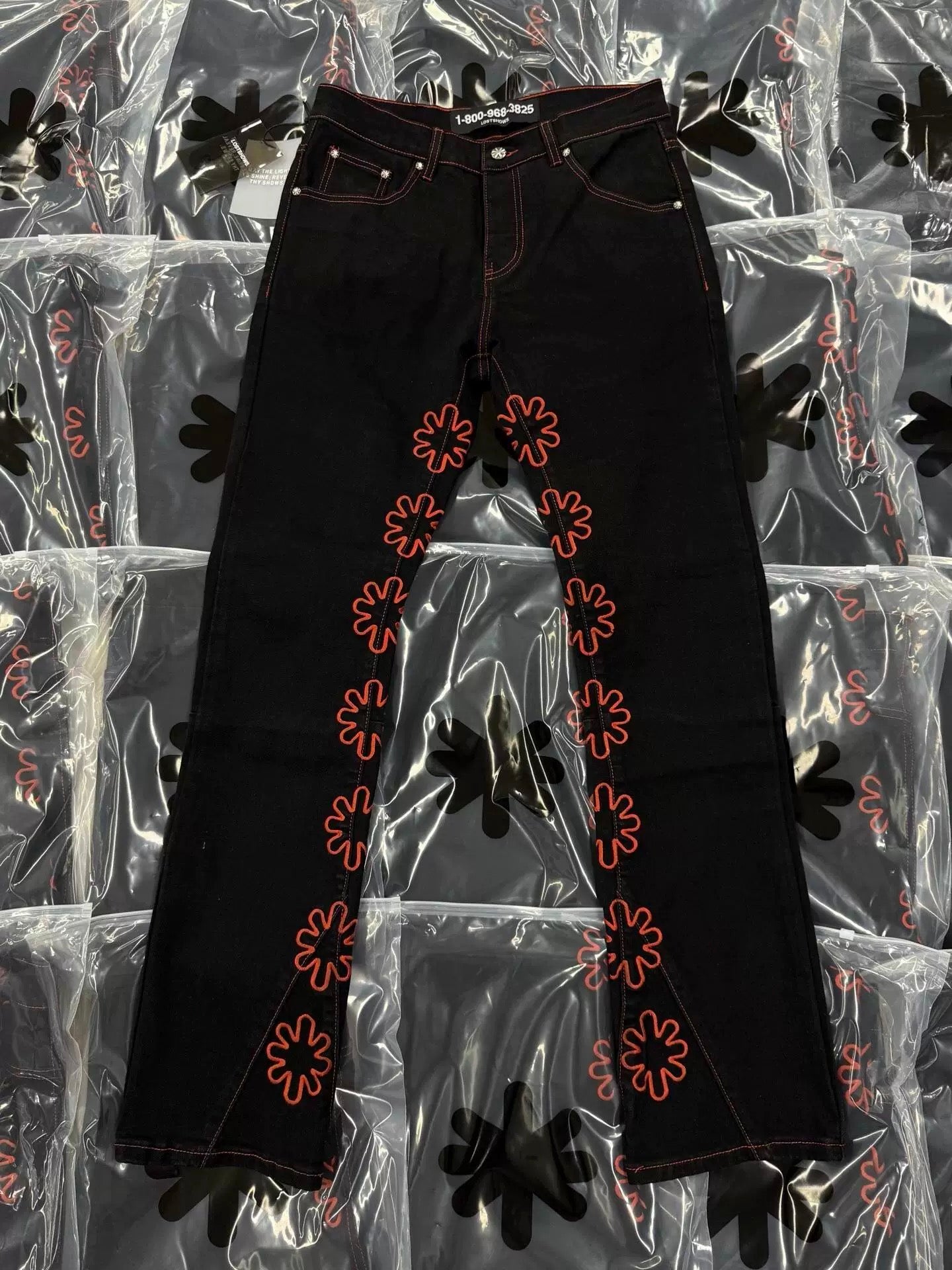 S Flower Stacked Flared Jeans