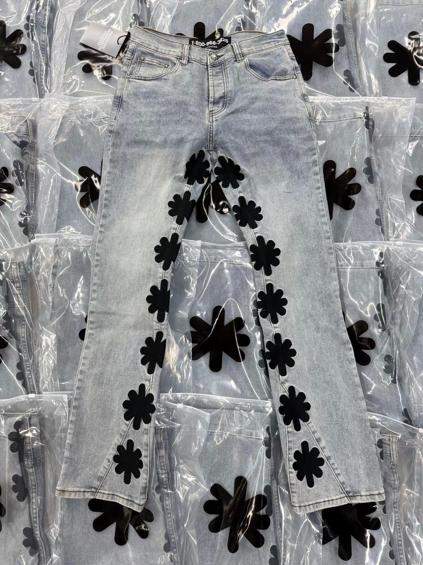 S Flower Stacked Flared Jeans