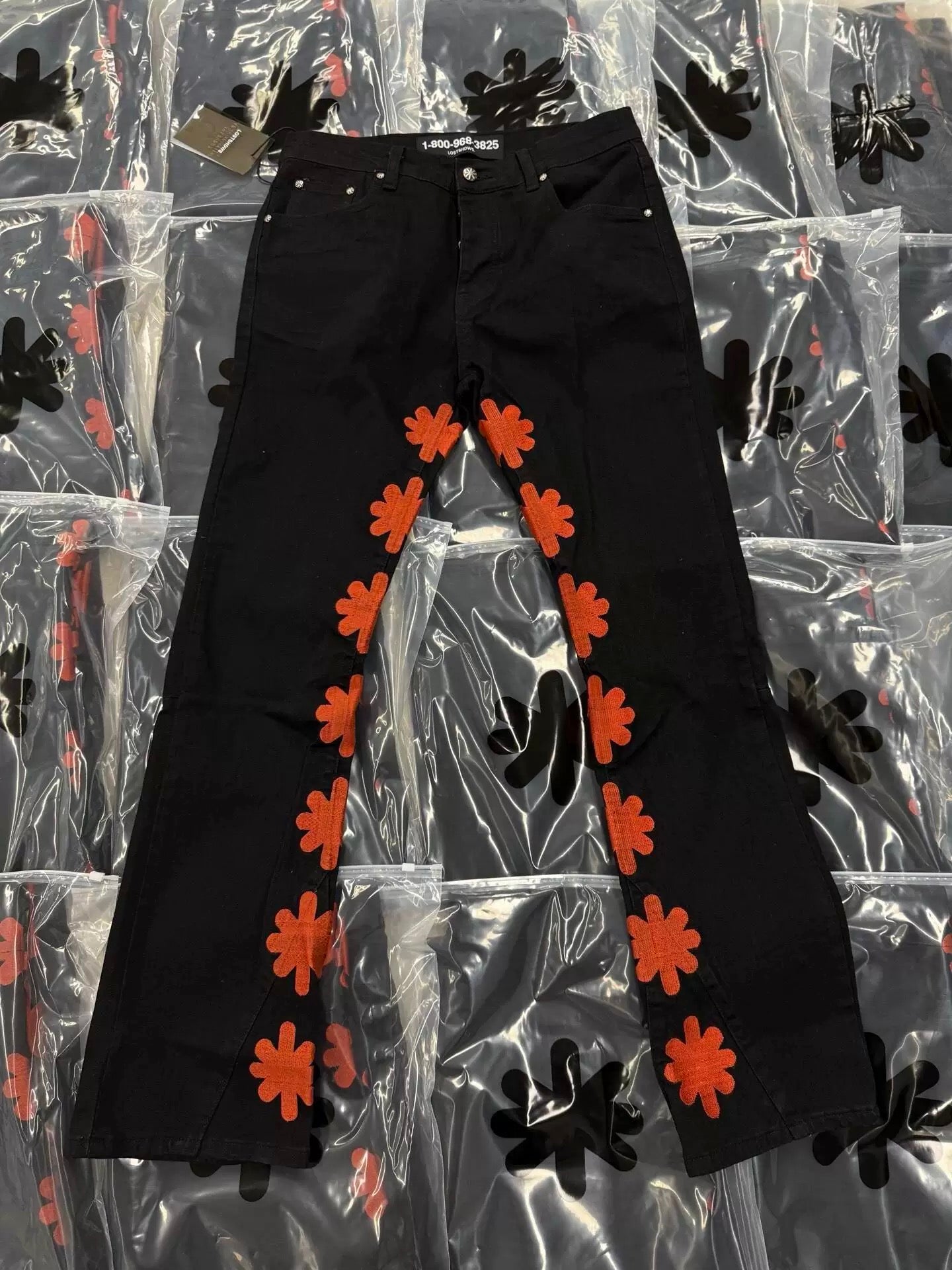 S Flower Stacked Flared Jeans